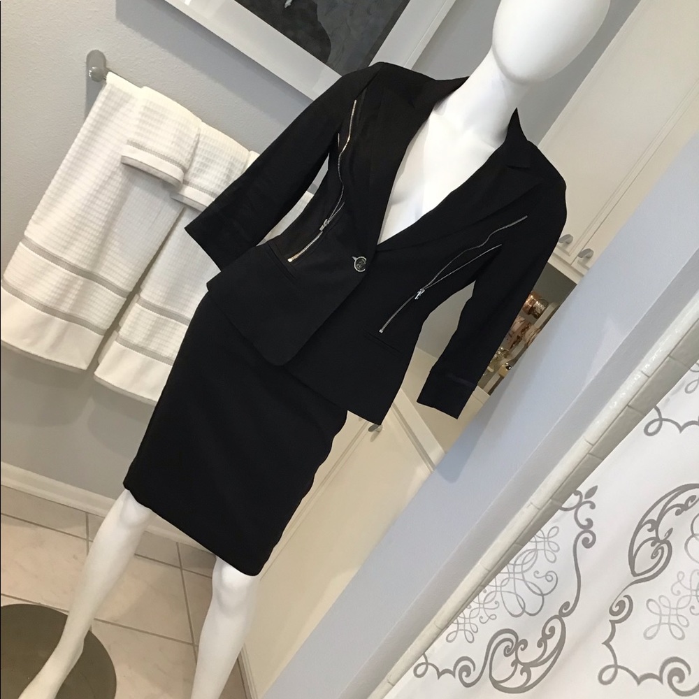 Bebe stretch linen suit with silver zipper detail.